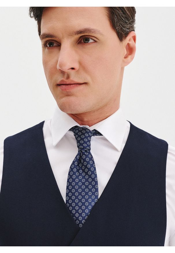 Pako Lorente - PAKO LORENTE –Granatowa dwurzędowa kamizelka męska. Kolor: czarny, niebieski. Materiał: wiskoza, poliester, elastan. Styl: młodzieżowy, elegancki