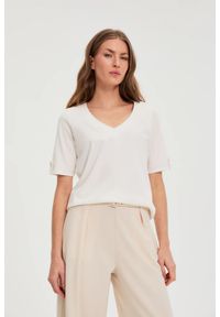 MOODO - Bluzka z dekoltem w serek biała. Typ kołnierza: dekolt w serek. Kolor: biały. Materiał: bawełna #1