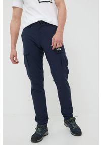 Helly Hansen spodnie outdoorowe męskie kolor granatowy. Kolor: niebieski. Materiał: materiał, tkanina
