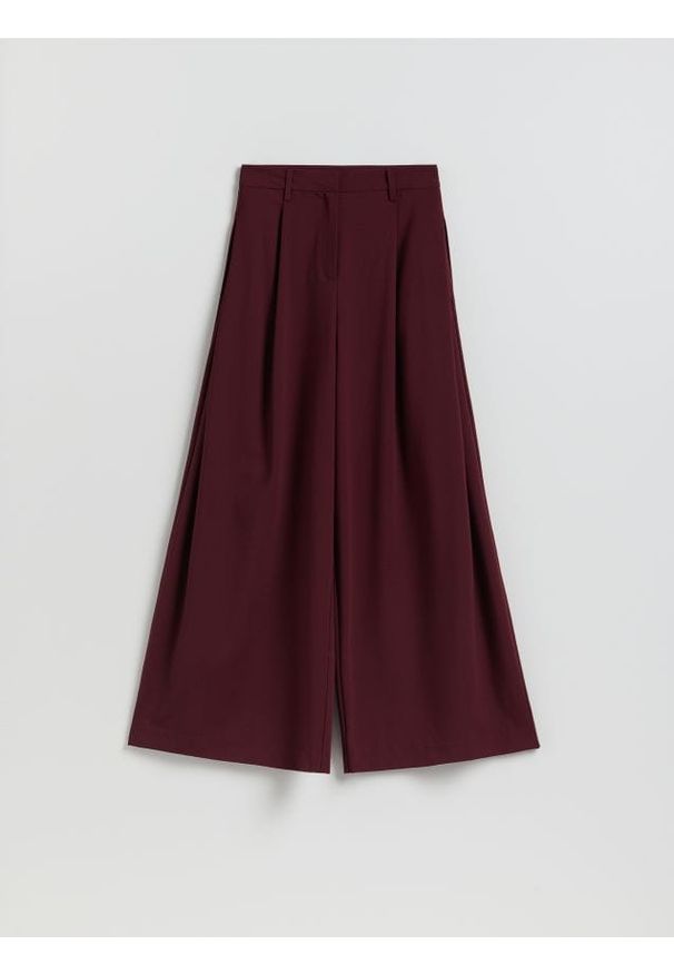 Reserved - Spodnie z szerokimi nogawkami - bordowy. Kolor: czerwony. Materiał: dzianina, wiskoza