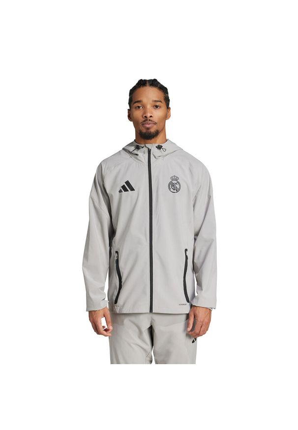 Adidas - Kurtka przeciwdeszczowa z kapturem Real Madrid Competition Tiro 2024/25. Typ kołnierza: kaptur. Kolor: zielony, szary, wielokolorowy. Sport: piłka nożna