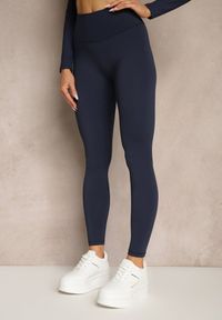 Renee - Granatowy Komplet Sportowy Legginsy High Waist i Longsleeve z Ozdobnym Tyłem Dasalle. Kolor: niebieski