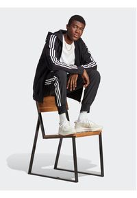 Adidas - adidas Spodnie dresowe AEROREADY Essentials Tapered Cuff Woven 3-Stripes Joggers IC0041 Czarny Regular Fit. Kolor: czarny. Materiał: syntetyk #3