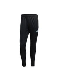 Adidas - Spodnie męskie adidas Tiro 23 Club Training Tracksuit Bottoms. Kolor: niebieski, wielokolorowy, czarny. Materiał: dresówka, materiał