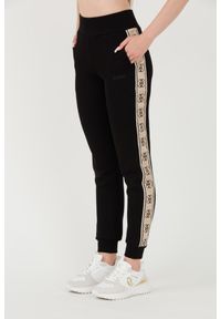 Guess - GUESS Czarne damskie spodnie dresowe Britney Jogger, Rozmiar XL. Kolor: czarny. Materiał: dresówka