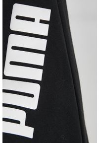 Puma Spodnie damskie kolor czarny gładkie. Kolor: czarny. Materiał: dzianina, materiał. Wzór: gładki