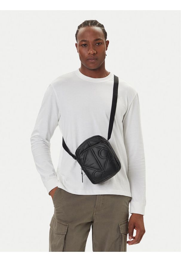 Calvin Klein Nerka Puffer Reporter LV04D3164G Czarny. Kolor: czarny. Materiał: materiał