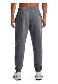 Under Armour Spodnie dresowe UA Essential Fleece Jogger 1373882 Szary Regular Fit. Kolor: szary. Materiał: dresówka