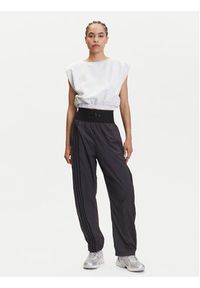 Adidas - adidas Spodnie dresowe JJ0920 Szary Loose Fit. Kolor: szary. Materiał: syntetyk #2