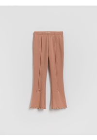 Reserved - Ocieplane legginsy flare z kokardkami - brązowy. Kolor: brązowy. Materiał: dzianina #1