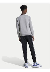 Adidas - adidas Spodnie dresowe adicolor SST IX7630 Czarny Regular Fit. Kolor: czarny. Materiał: syntetyk #4