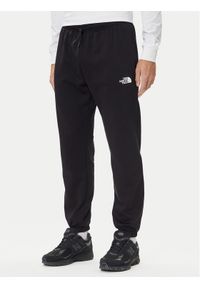 The North Face Spodnie dresowe Simple Dome NF0A8C1W Czarny Regular Fit. Kolor: czarny. Materiał: bawełna
