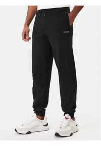 Guess Spodnie dresowe Z6RB12 KAIJ1 Czarny Regular Fit. Kolor: czarny. Materiał: bawełna #1