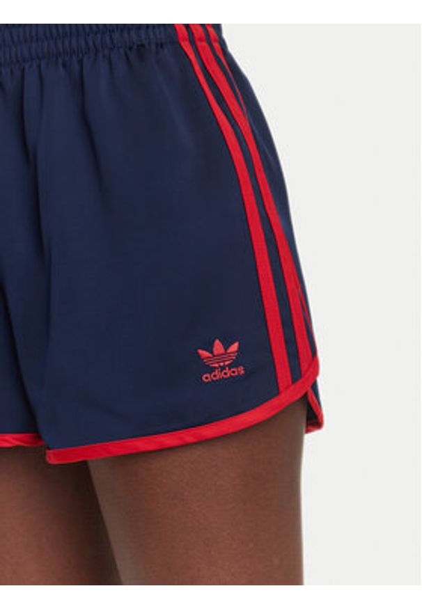 Adidas - adidas Szorty sportowe adicolor 3-Stripes Sprinter JZ3514 Granatowy Loose Fit. Kolor: niebieski. Materiał: syntetyk