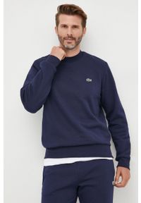 Lacoste bluza męska kolor granatowy gładka SH9608-132. Kolor: niebieski. Materiał: bawełna, poliester. Wzór: gładki
