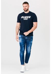 Guess - GUESS Granatowy t-shirt męski z odblaskowym logo. Kolor: niebieski #3