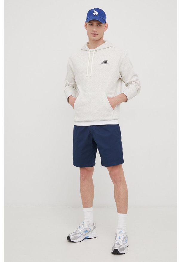 New Balance bluza męska kolor szary z kapturem melanżowa. Typ kołnierza: kaptur. Kolor: szary. Materiał: materiał. Wzór: melanż
