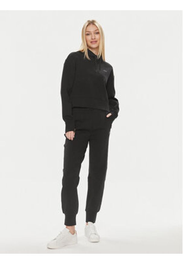 Lacoste Spodnie dresowe XF0343 Czarny Regular Fit. Kolor: czarny. Materiał: bawełna