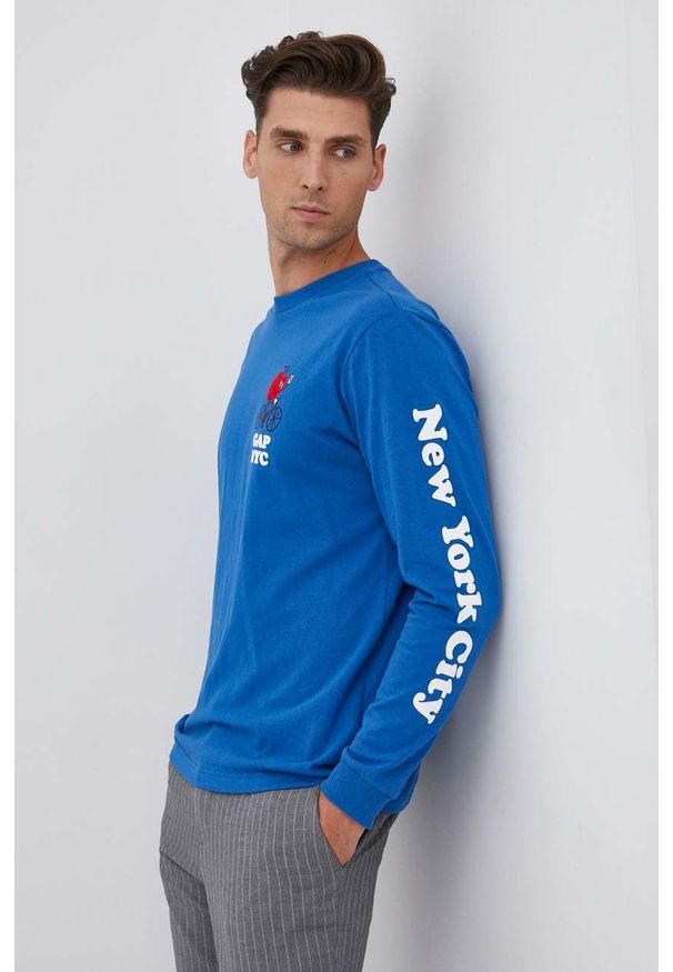 GAP - Longsleeve bawełniany. Okazja: na co dzień. Kolor: niebieski. Materiał: bawełna. Długość rękawa: długi rękaw. Wzór: nadruk. Styl: casual