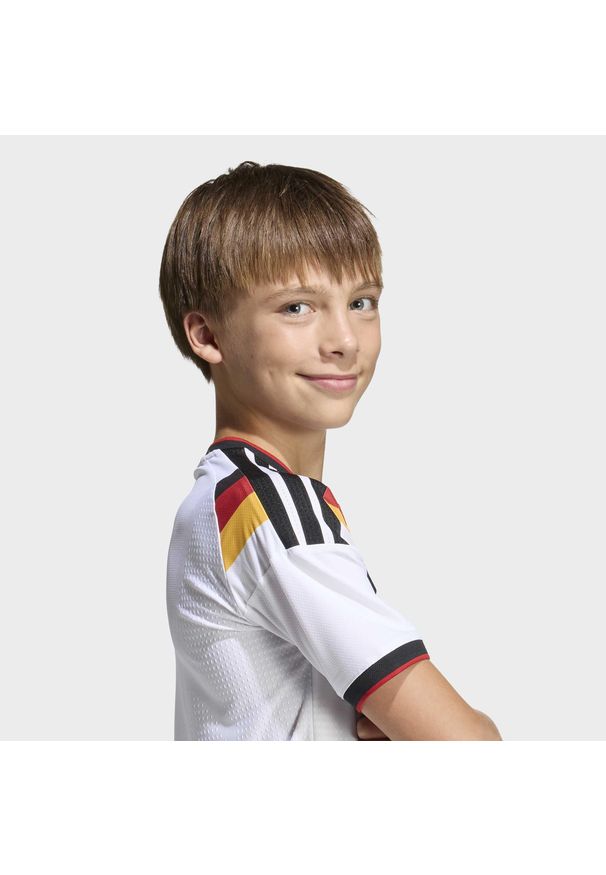 Adidas - Dziecięca koszulka podstawowa Germany 26. Kolor: wielokolorowy, biały, czarny. Technologia: ClimaCool (Adidas). Sport: piłka nożna