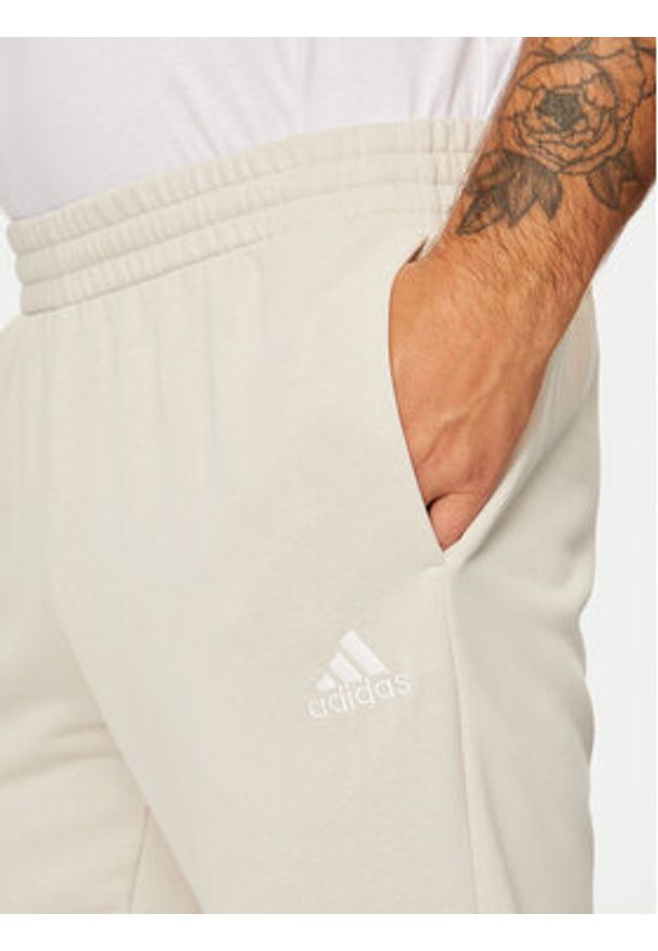 Adidas - adidas Dres Basic 3-Stripes French Terry IY6653 Beżowy Regular Fit. Kolor: beżowy. Materiał: bawełna, syntetyk