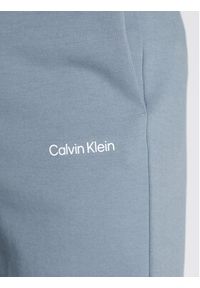 Calvin Klein Spodnie dresowe Micro Logo K10K109940 Szary Relaxed Fit. Kolor: szary. Materiał: syntetyk, dresówka, bawełna #4