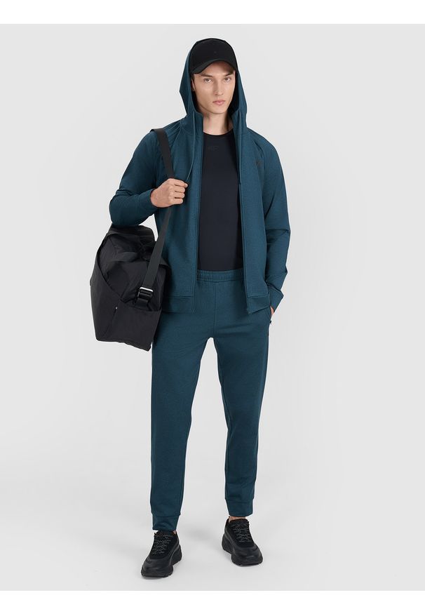 4f - 4F Spodnie treningowe szybkoschnące męskie - granatowe M. Kolor: niebieski. Materiał: tkanina, elastan, włókno, syntetyk, materiał. Sport: fitness