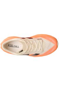 Buty męskie New Balance FuelCell Rebel v4 MFCXCO4 – pomarańczowe. Okazja: na co dzień. Kolor: pomarańczowy. Materiał: materiał, syntetyk, guma. Szerokość cholewki: normalna. Sport: fitness, bieganie #5