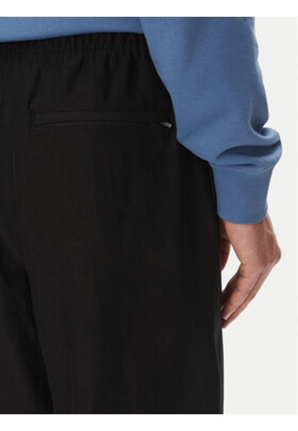 Calvin Klein Jeans Spodnie dresowe Premium LV04RC279G Czarny Regular Fit. Kolor: czarny. Materiał: bawełna