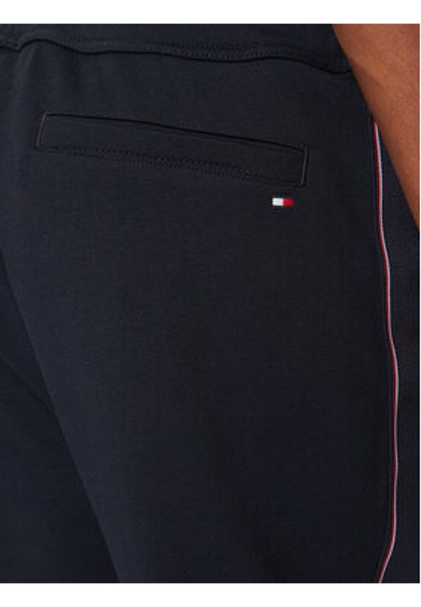 TOMMY HILFIGER - Tommy Hilfiger Spodnie dresowe MW0MW37477 Granatowy Regular Fit. Kolor: niebieski. Materiał: bawełna