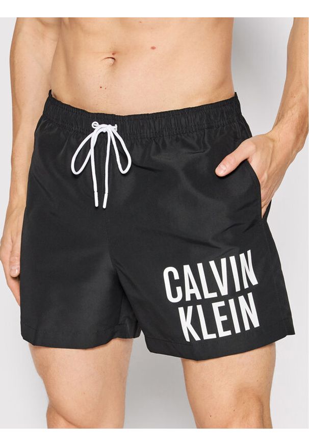Calvin Klein Swimwear Szorty kąpielowe Medium KM0KM00739 Czarny Regular Fit. Kolor: czarny. Materiał: syntetyk