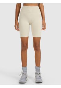 4f - 4F Legginsy kolarki treningowe bezszwowe damskie - beżowe XS/S. Stan: podwyższony. Kolor: beżowy. Materiał: materiał, elastan, syntetyk, dzianina, włókno. Długość: krótkie. Wzór: gładki. Sport: fitness
