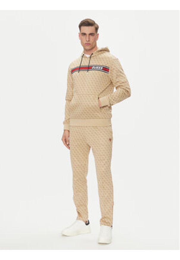 Guess Spodnie dresowe Korbin Z2BB05 FL04Q Beżowy Regular Fit. Kolor: beżowy. Materiał: bawełna