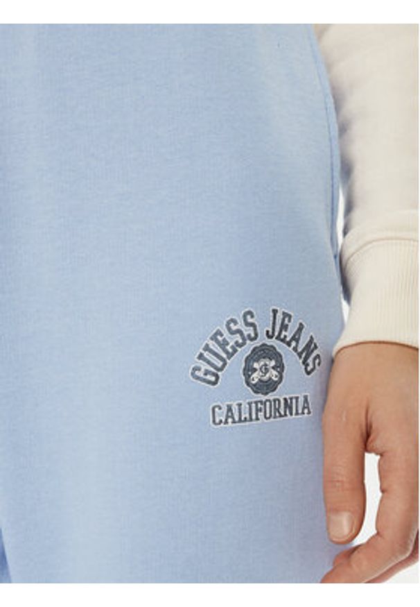 Guess Jeans Spodnie dresowe W5RB63 K68I4 Niebieski Regular Fit. Kolor: niebieski. Materiał: bawełna