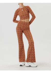 Sinsay - Crop top z długim rękawem i geometrycznym wzorem - wielobarwny. Długość rękawa: długi rękaw. Długość: długie. Wzór: geometria #1