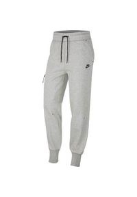 Spodnie treningowe damskie Nike Tech Fleece. Kolor: czarny, szary, wielokolorowy. Materiał: dresówka #1