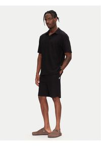 Jack & Jones - Jack&Jones Komplet polo i spodenki Slington 12281841 Czarny Relaxed Fit. Kolor: czarny. Materiał: bawełna
