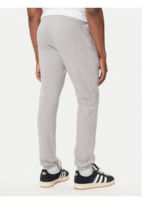 Adidas - adidas Spodnie dresowe Trefoil Essentials JY6271 Szary Slim Fit. Kolor: szary. Materiał: bawełna #3