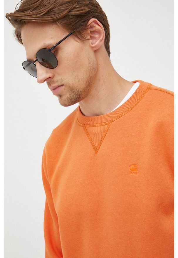 G-Star RAW - G-Star Raw Bluza męska kolor pomarańczowy. Kolor: pomarańczowy. Materiał: dzianina, poliester. Wzór: gładki