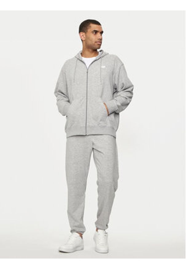 New Balance Spodnie dresowe Essentials MP41519 Szary Relaxed Fit. Kolor: szary. Materiał: syntetyk, bawełna