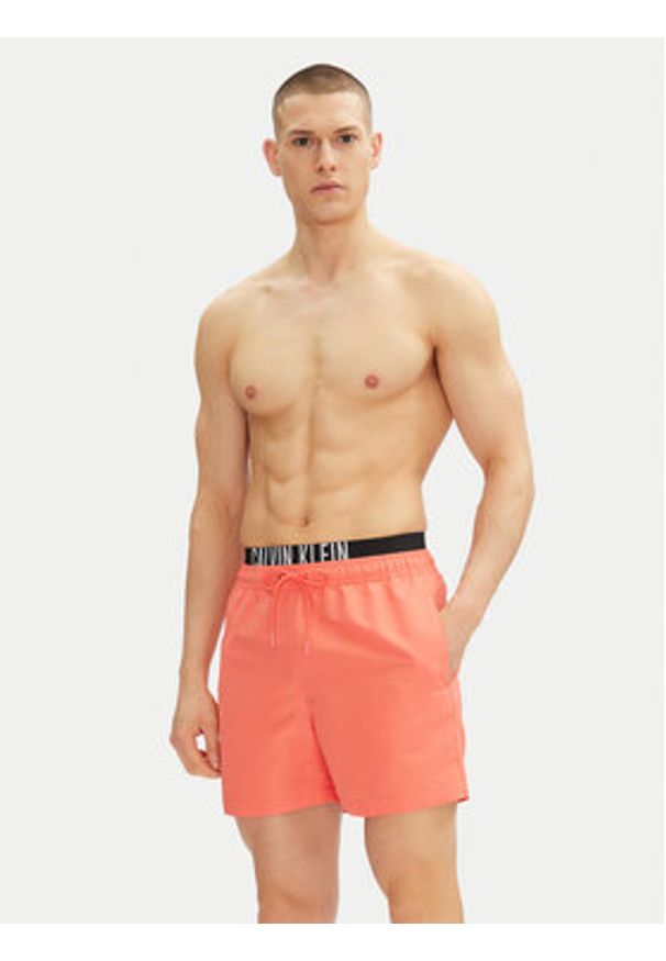Calvin Klein Swimwear Szorty kąpielowe KM0KM01093 Różowy Regular Fit. Kolor: różowy. Materiał: syntetyk