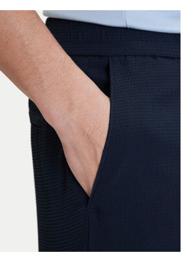 Calvin Klein Szorty materiałowe LV04LF610G Niebieski Straight Fit. Kolor: niebieski. Materiał: syntetyk
