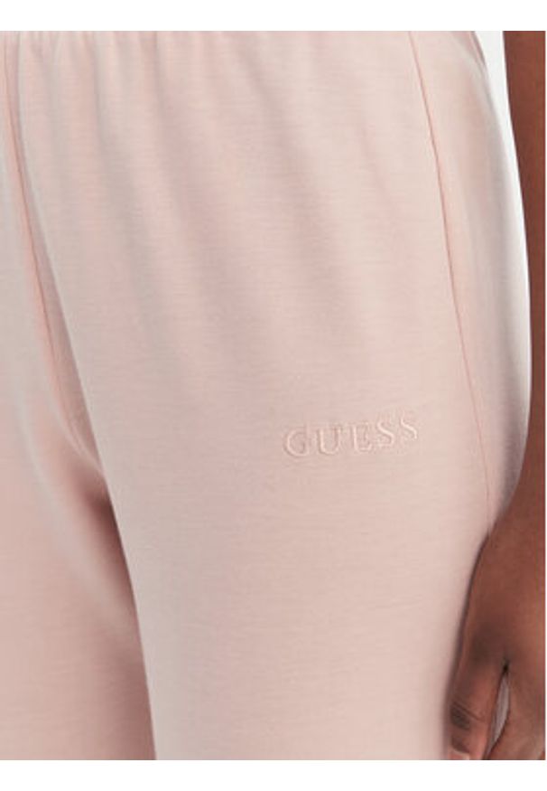 Guess Spodnie dresowe O6GB01 KCQP2 Różowy Regular Fit. Kolor: różowy. Materiał: syntetyk, wiskoza
