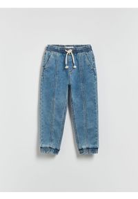 Reserved - Jeansy jogger - niebieski. Kolor: niebieski