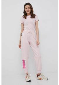 Puma spodnie bawełniane 847127 damskie kolor różowy z nadrukiem. Kolor: różowy. Materiał: bawełna. Wzór: nadruk #4