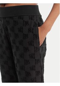 Hugo - HUGO Spodnie dresowe Monogram 50556809 Czarny Regular Fit. Kolor: czarny. Materiał: bawełna #5