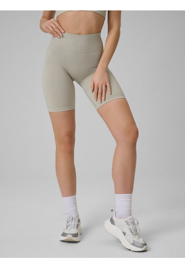 4f - 4F Legginsy kolarki treningowe bezszwowe damskie - beżowe M/L. Stan: podwyższony. Kolor: beżowy. Materiał: materiał. Sport: fitness