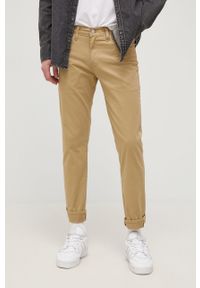 Levi's® - Levi's spodnie 511 męskie kolor beżowy dopasowane. Okazja: na spotkanie biznesowe. Kolor: beżowy. Materiał: materiał, tkanina. Wzór: gładki. Styl: biznesowy