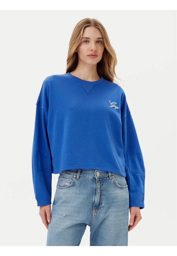 GAP - Gap Bluza 767368-02b Niebieski Oversize. Kolor: niebieski. Materiał: bawełna