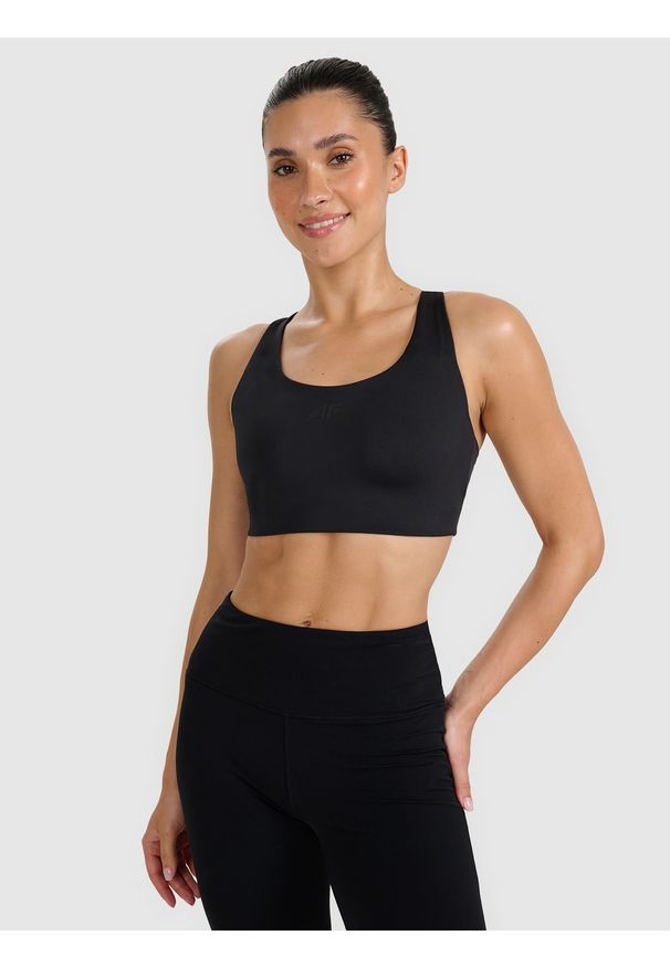 4f - 4F Biustonosz treningowy ze średnim wsparciem - czarny S. Kolor: czarny. Materiał: materiał, syntetyk, włókno, elastan, guma. Wzór: ze splotem, gładki. Sport: kolarstwo, fitness, bieganie